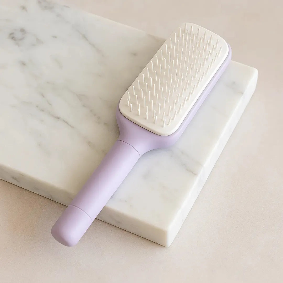 Blooméa™ HairLift – Self-Cleaning Rotating & Anti-Static Detangling Comb